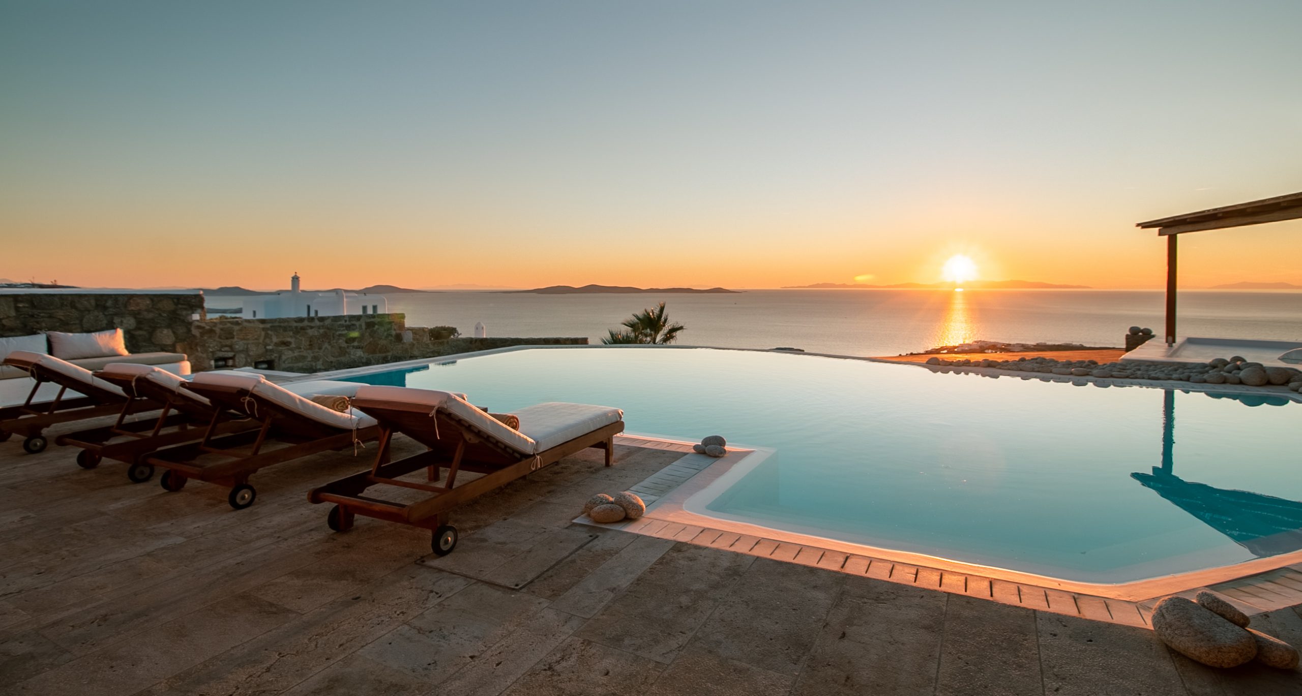 What are the pros of renting a private villa in Mykonos